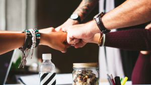 https://www.pexels.com/photo/colleagues-cooperation-fist-bump-fists-398532/